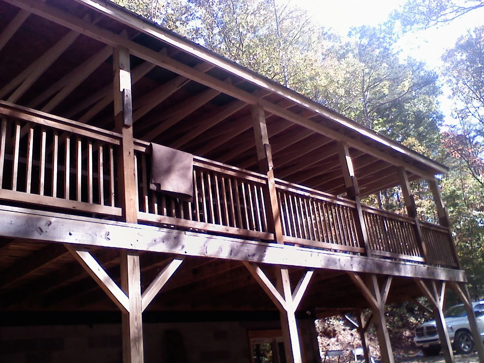 Timber framing under a new elevated porch and deck — Roof Leak Repair in Grant Park by Roofing Brothers
